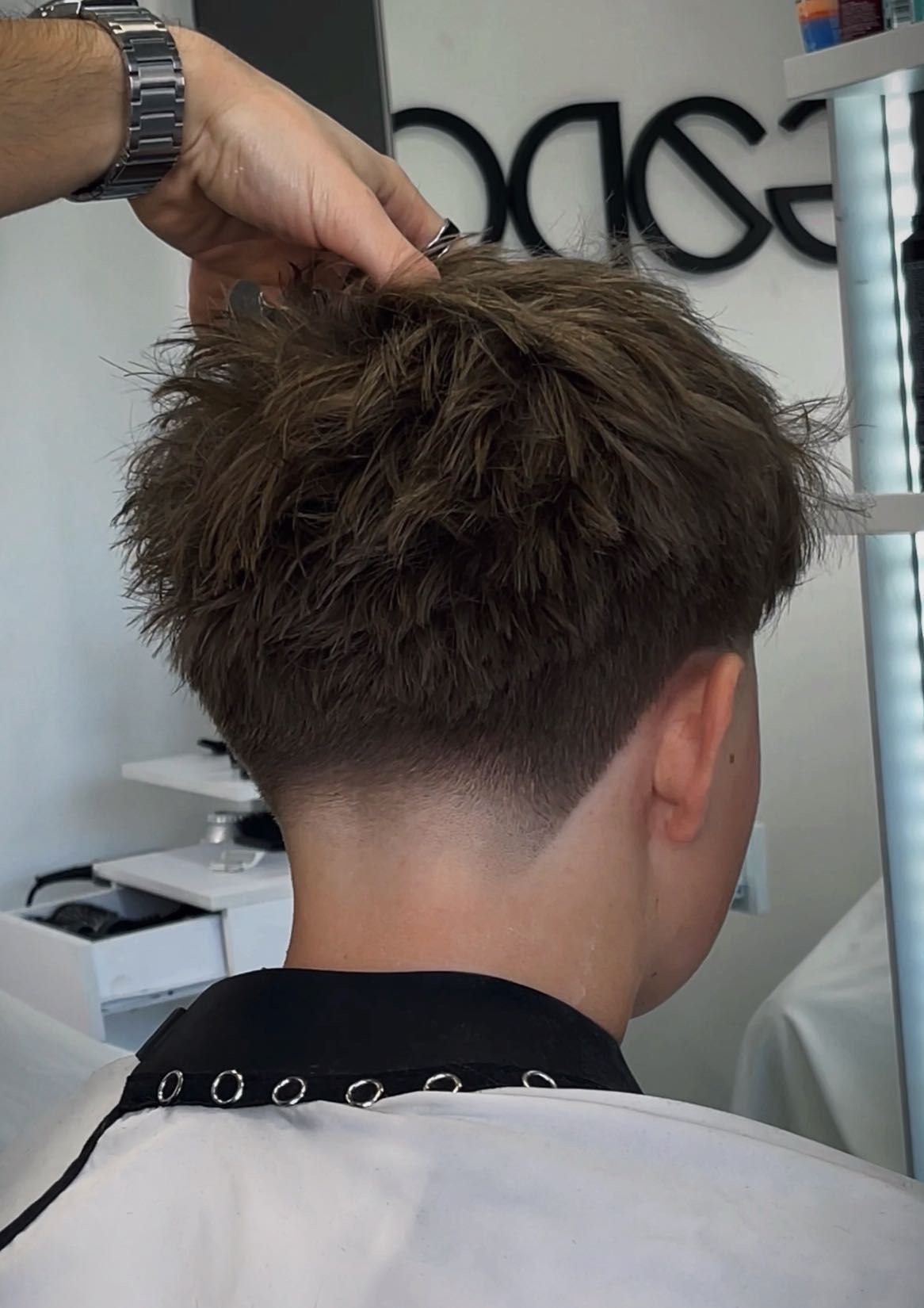 Corte con logo Legado